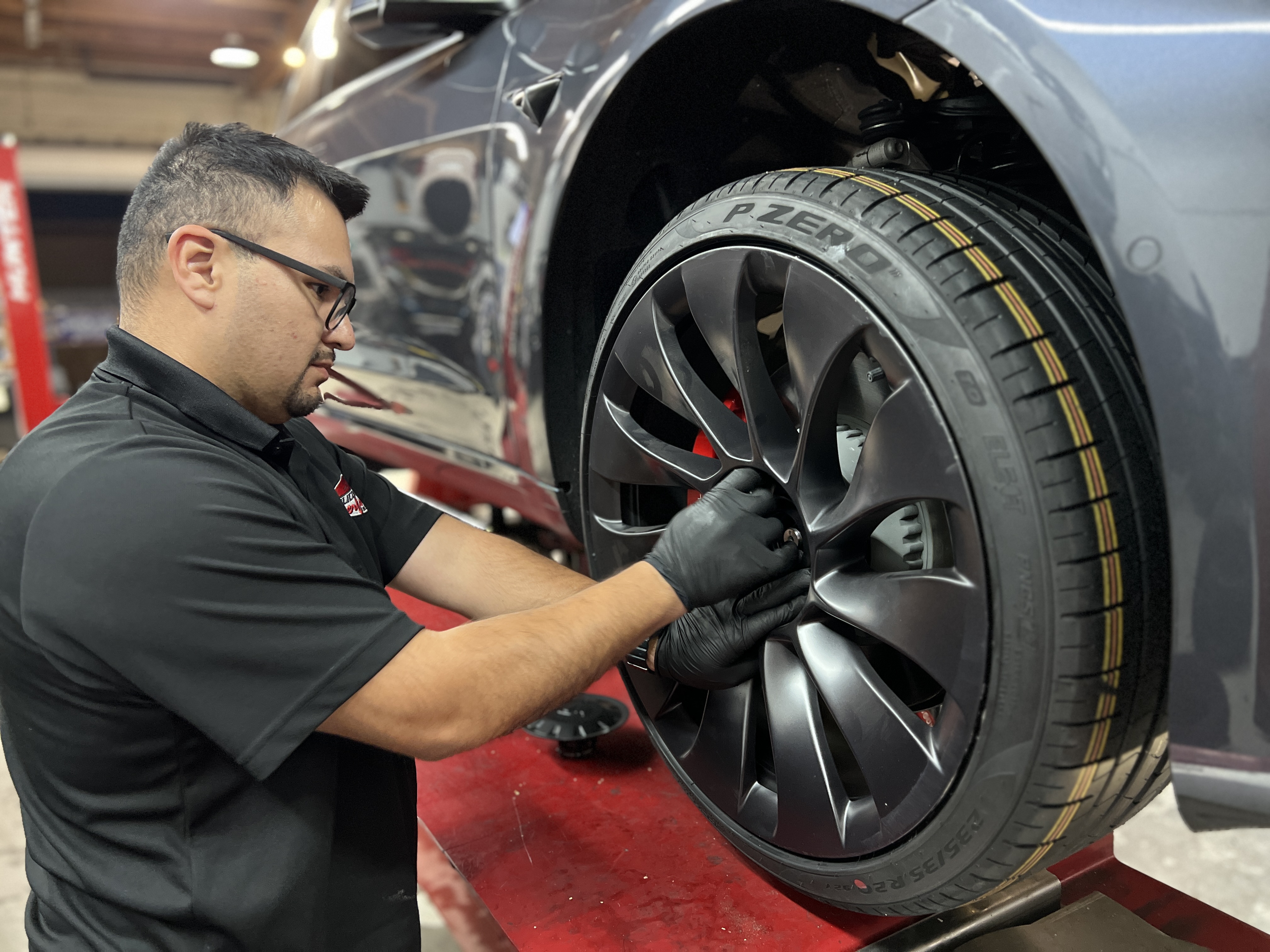 Our Expert Team Installing a Brand New Tire | Silicon Valley Performance Truck & Auto Repair